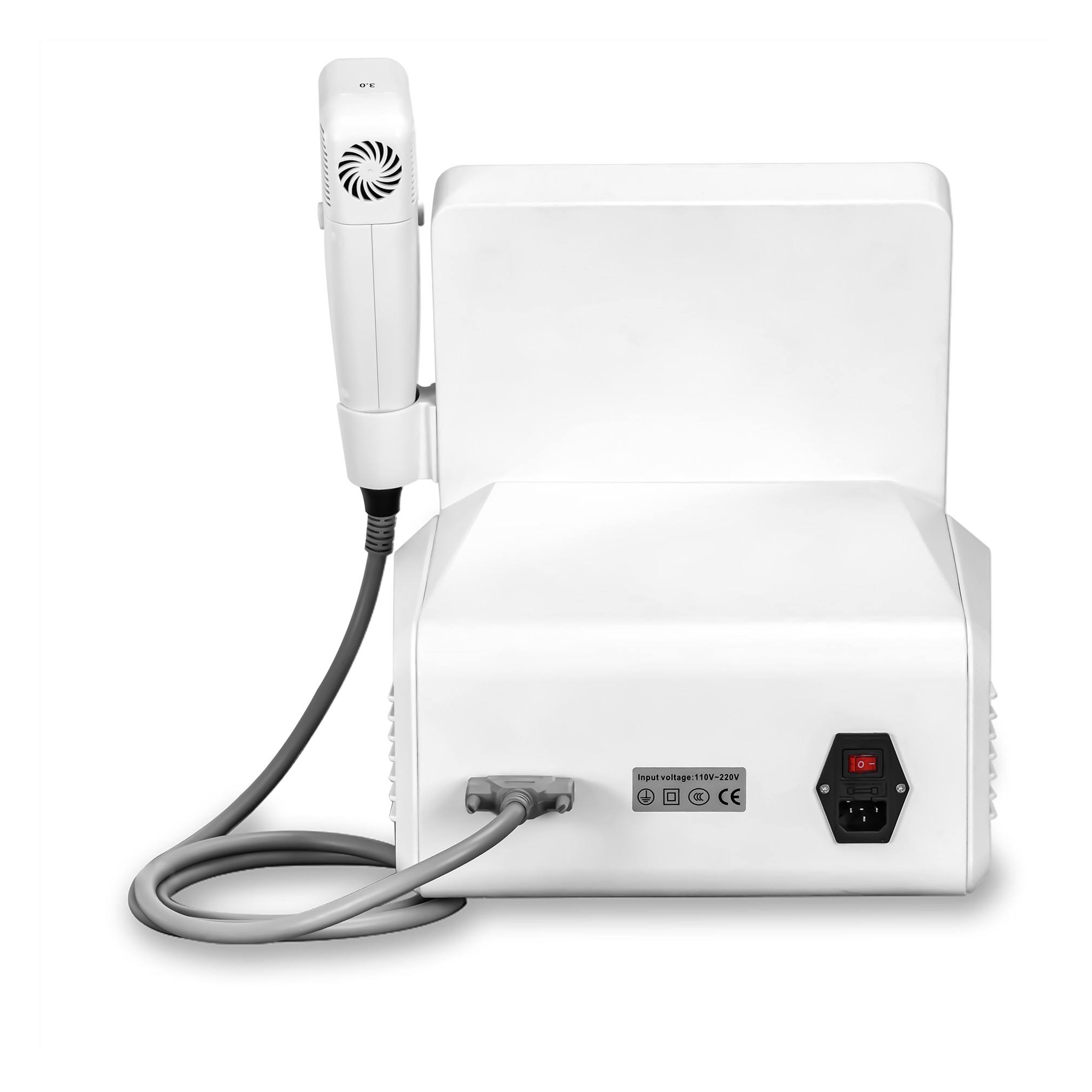 Rear view of a white ultrasonic cavitation machine with attached handpiece and power cord.