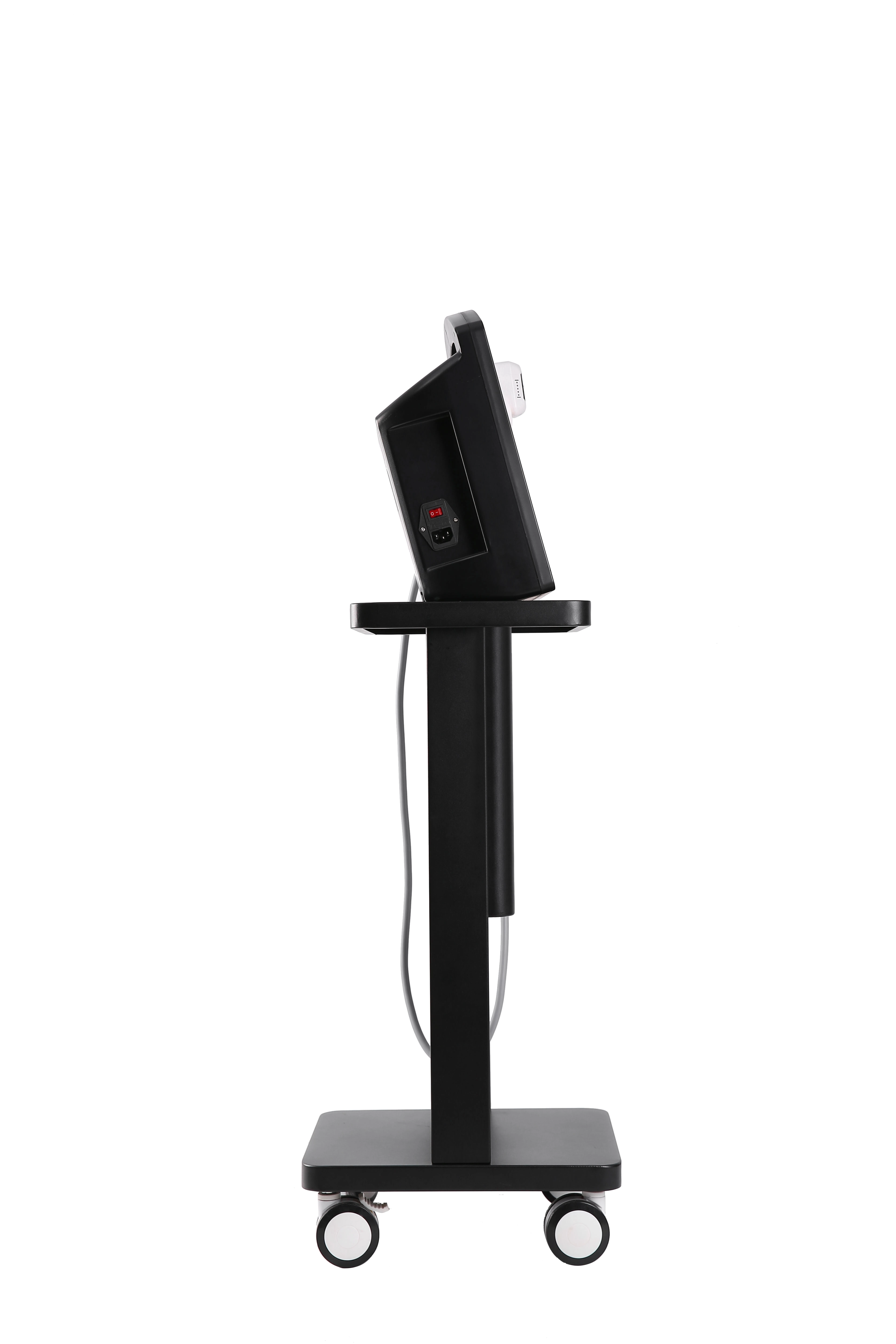 Side view of a black aesthetic machine on a rolling cart against a white background. - HUIMAIN