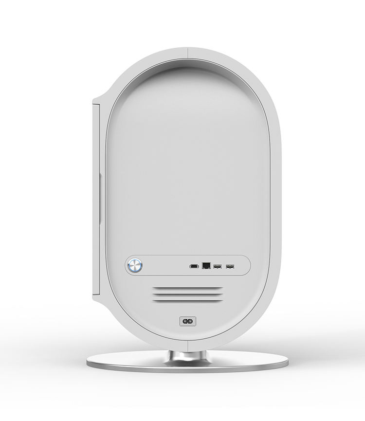 Back view of a white desktop computer with a unique, rounded design and silver stand.