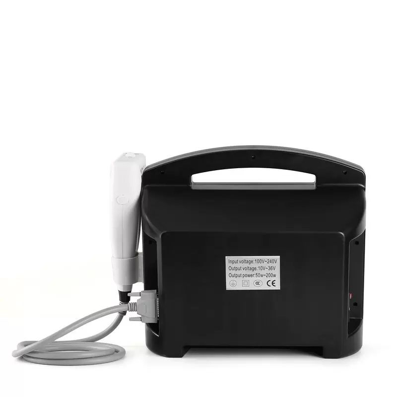 Rear view of a portable ultrasound therapy machine with handle and probe.