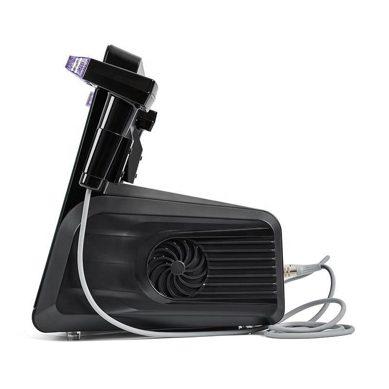 Black aesthetic medical device with handpieces and a cooling fan. - HUIMAIN