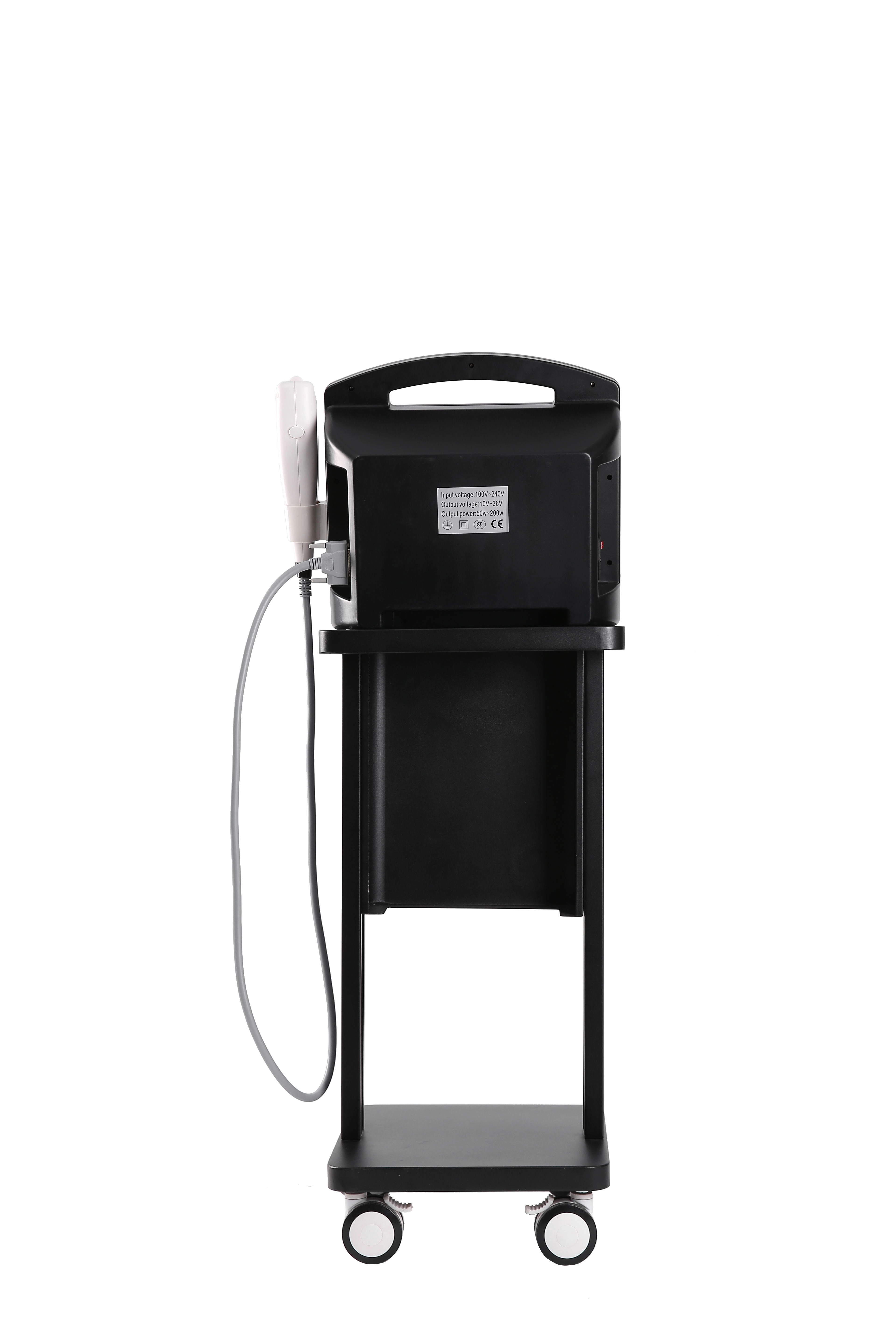 Rear view of a black portable beauty treatment machine on a white background. - HUIMAIN