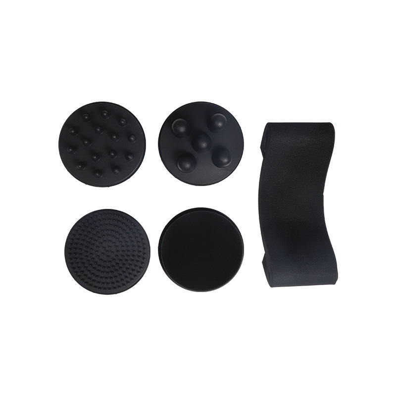 Black massage gun attachments including textured heads and a curved handle.