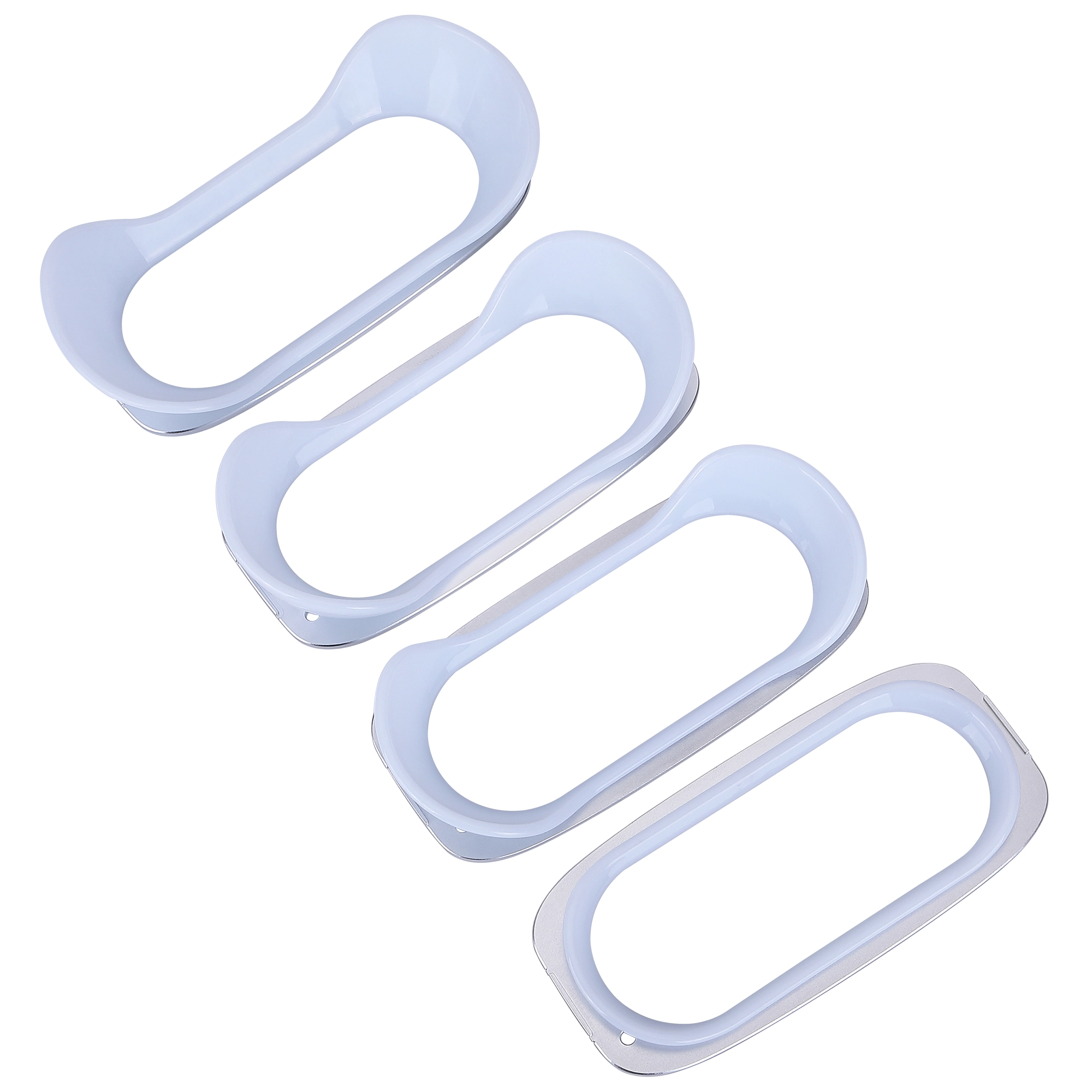 Four white oblong plastic trim pieces. - HUIMAIN